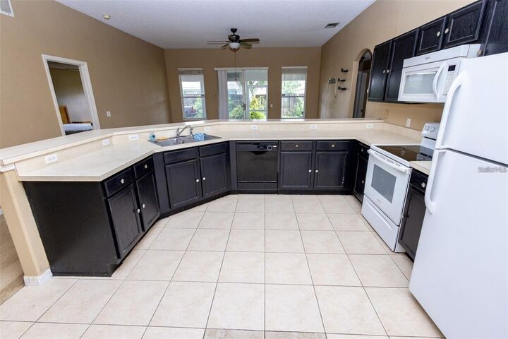 Property Photo:  818 Carrousel Lane  FL 34759 