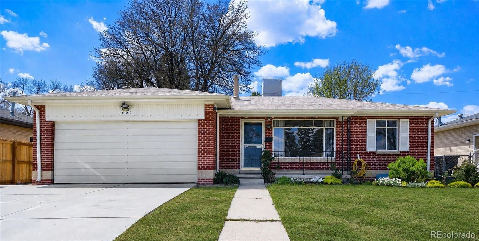 Property Photo:  1227 S Harlan Street  CO 80232 