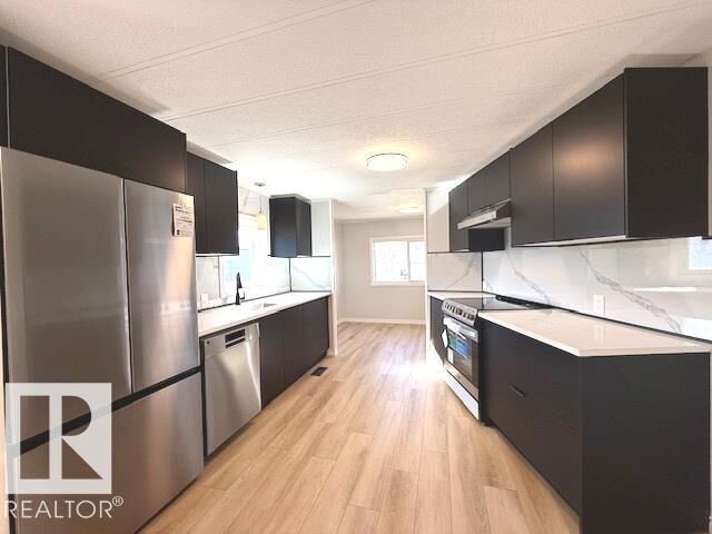Property Photo:  67 Ridgeway Drive NW  AB T6P 1G7 