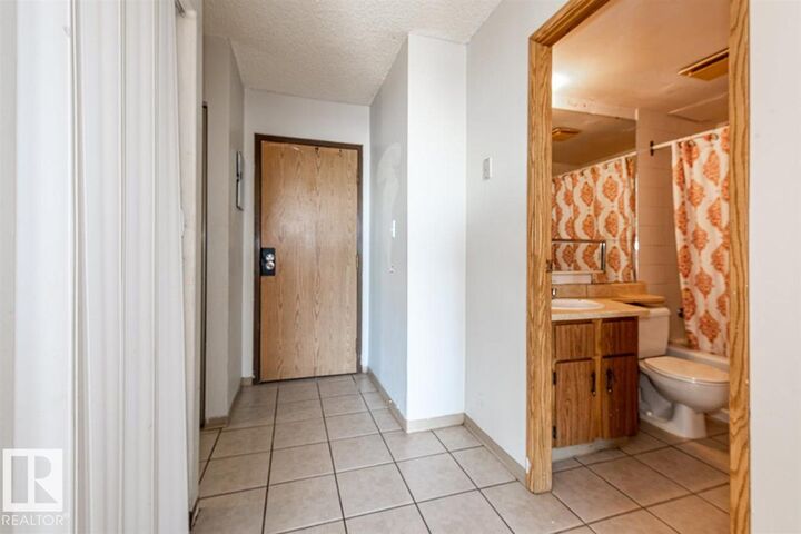 Property Photo:  12831 66 Street NW 606  AB T5C 0A4 