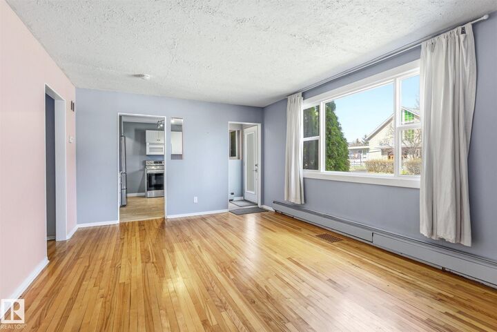 Property Photo:  10673 62 Avenue NW  AB T6H 1M7 