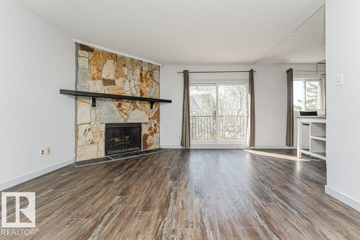 Property Photo:  14004 26 Street NW 308  AB T5Y 1Y4 