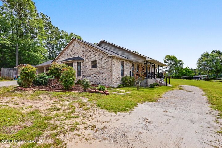 Property Photo:  17114 Doc Lizana Road  MS 39503 