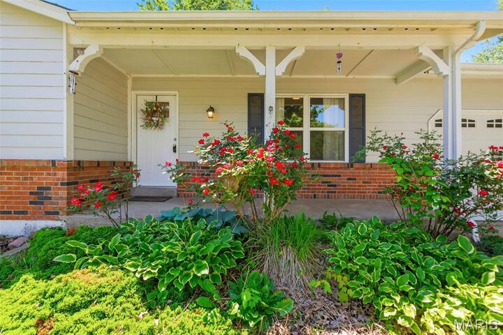 Property Photo:  806 Pepper Lane  MO 63366 