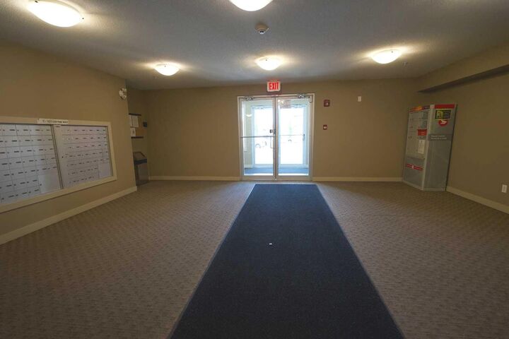Property Photo: 15 Saddlestone Way NE 409 AB T3J 0S3