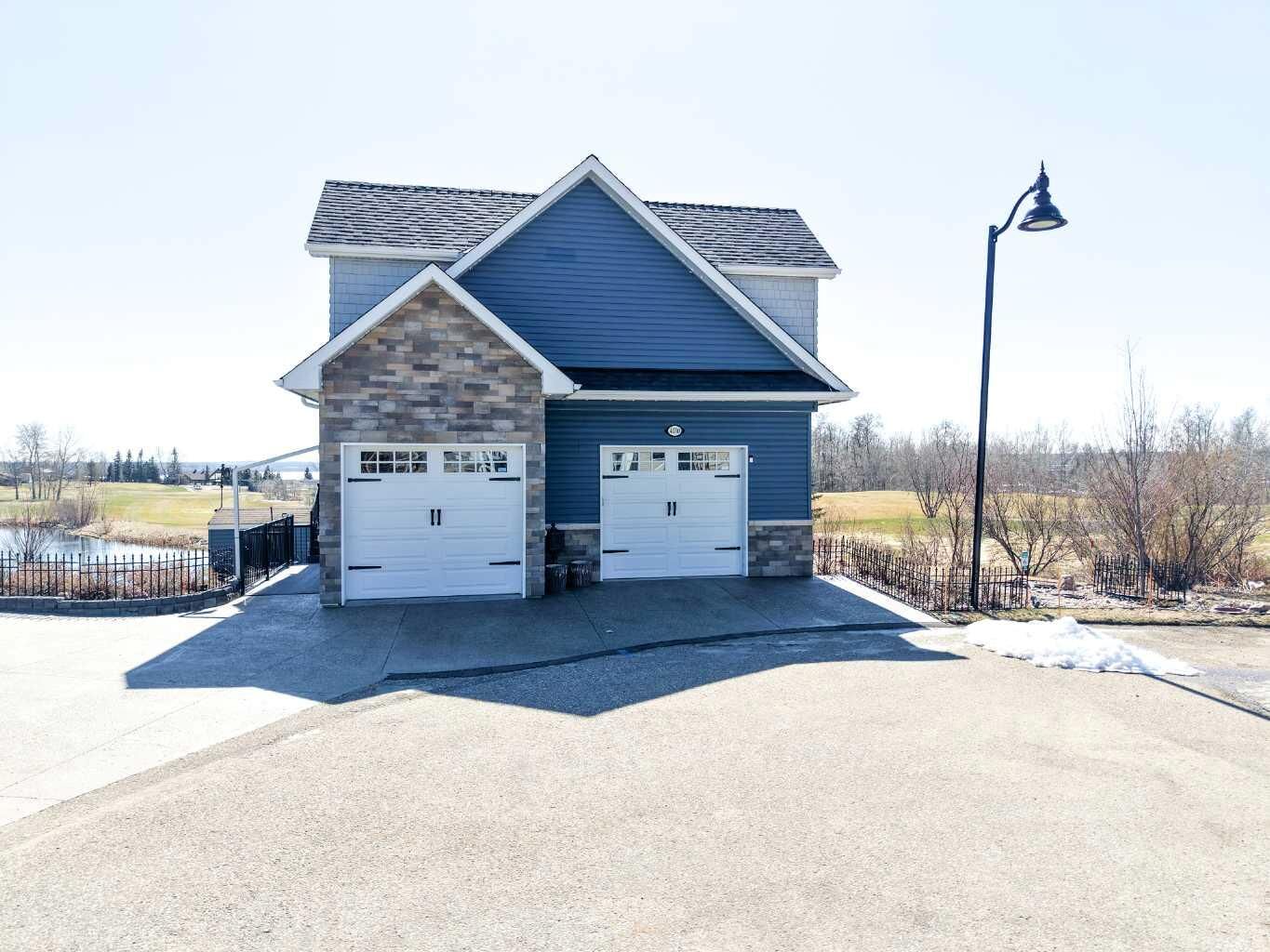 Property Photo:  25054 South Pine Lake Road 4030  AB T0M 1R0 
