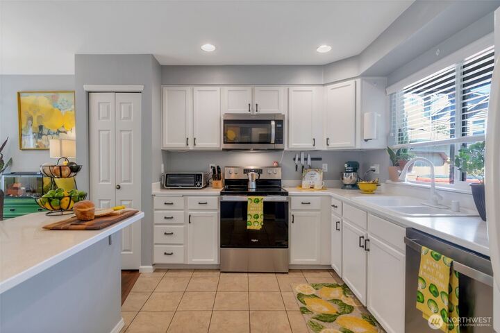 Property Photo:  5802  14th Drive W B  WA 98203 
