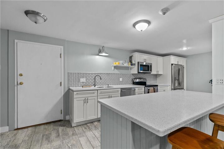 Property Photo:  66 Girard Avenue 114  RI 02840 