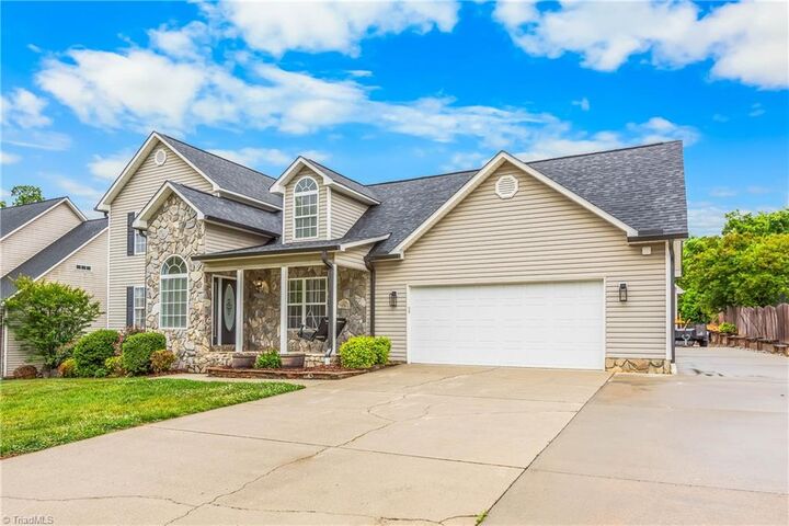 Property Photo:  203 Naola Court  NC 27263 