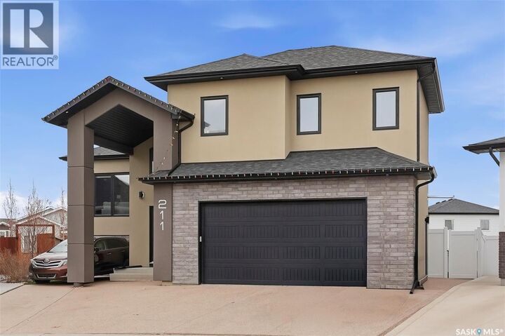 Property Photo:  211 Burgess Bay  SK S7V 0S3 
