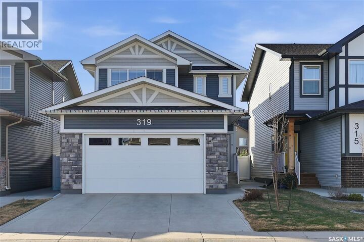 Property Photo:  319 Skopik Crescent  SK S7V 0V5 