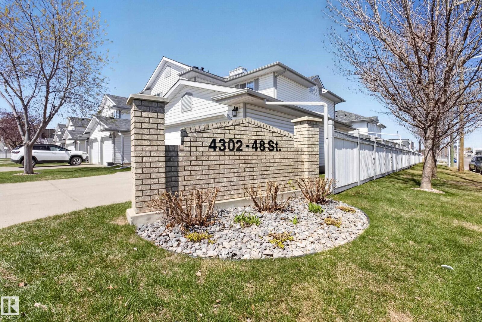 Property Photo:  4302 48 Street 110  AB T9E 8J6 