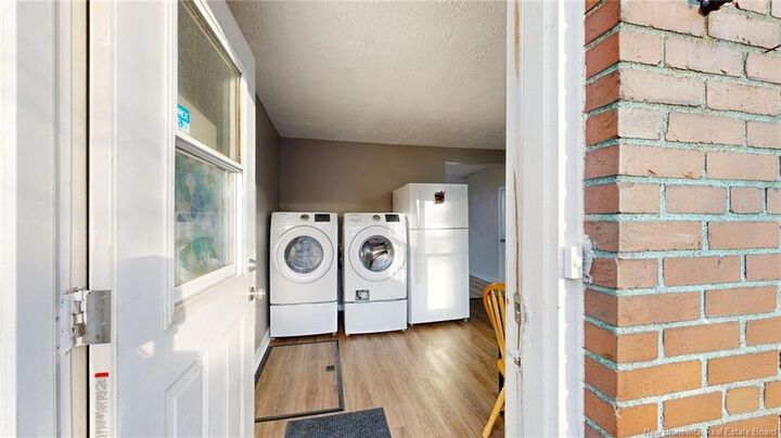 Property Photo:  235 Gilbert Street  NB E2K 4E4 