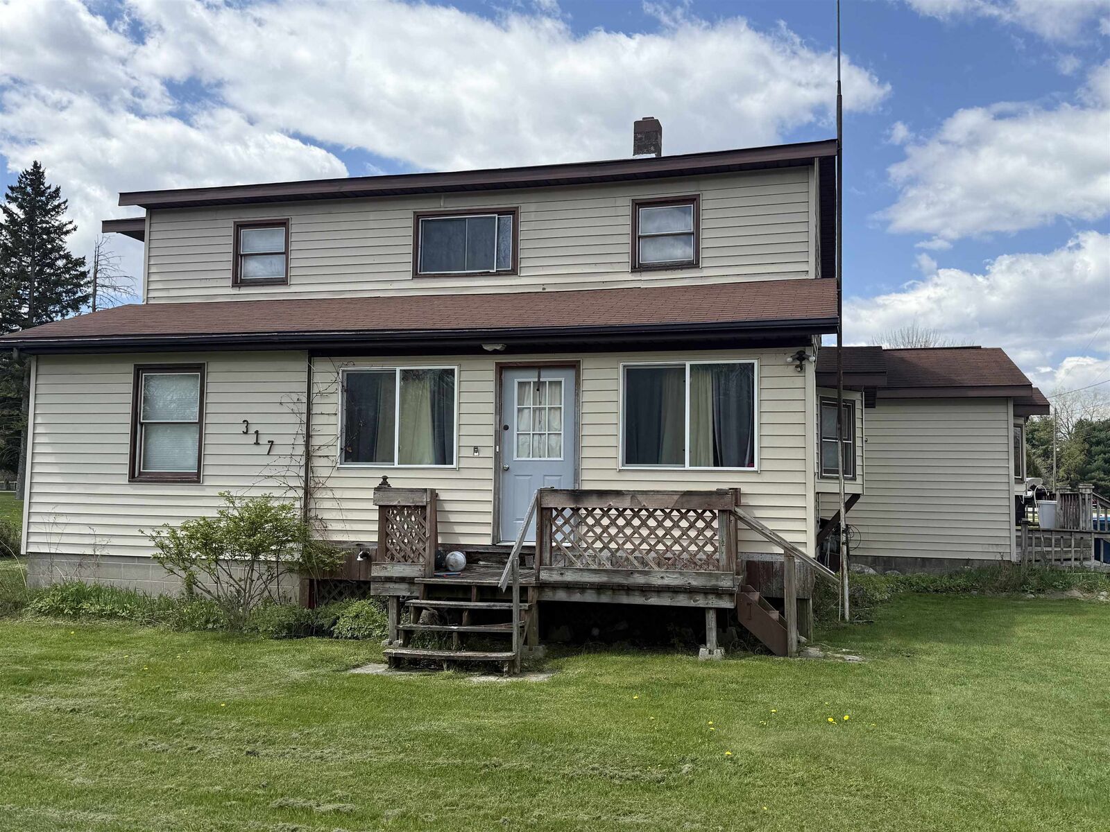 Property Photo:  317 Jackson Street  MI 48749 
