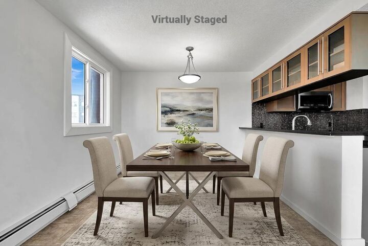 Property Photo:  429 14 Street NW 411  AB T2N 2A3 