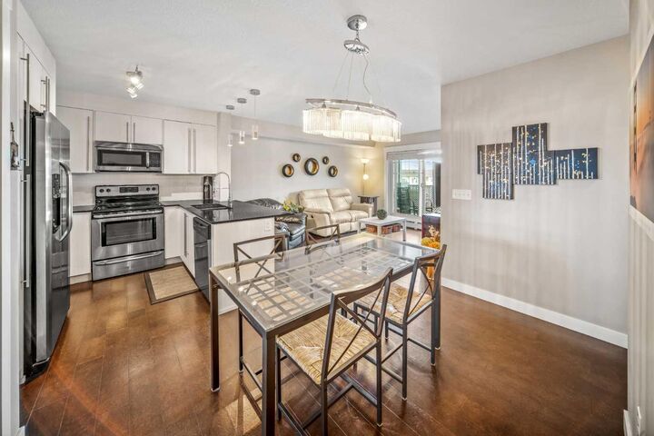 Property Photo:  11 Mahogany Row SE 3415  AB T3M 2L6 