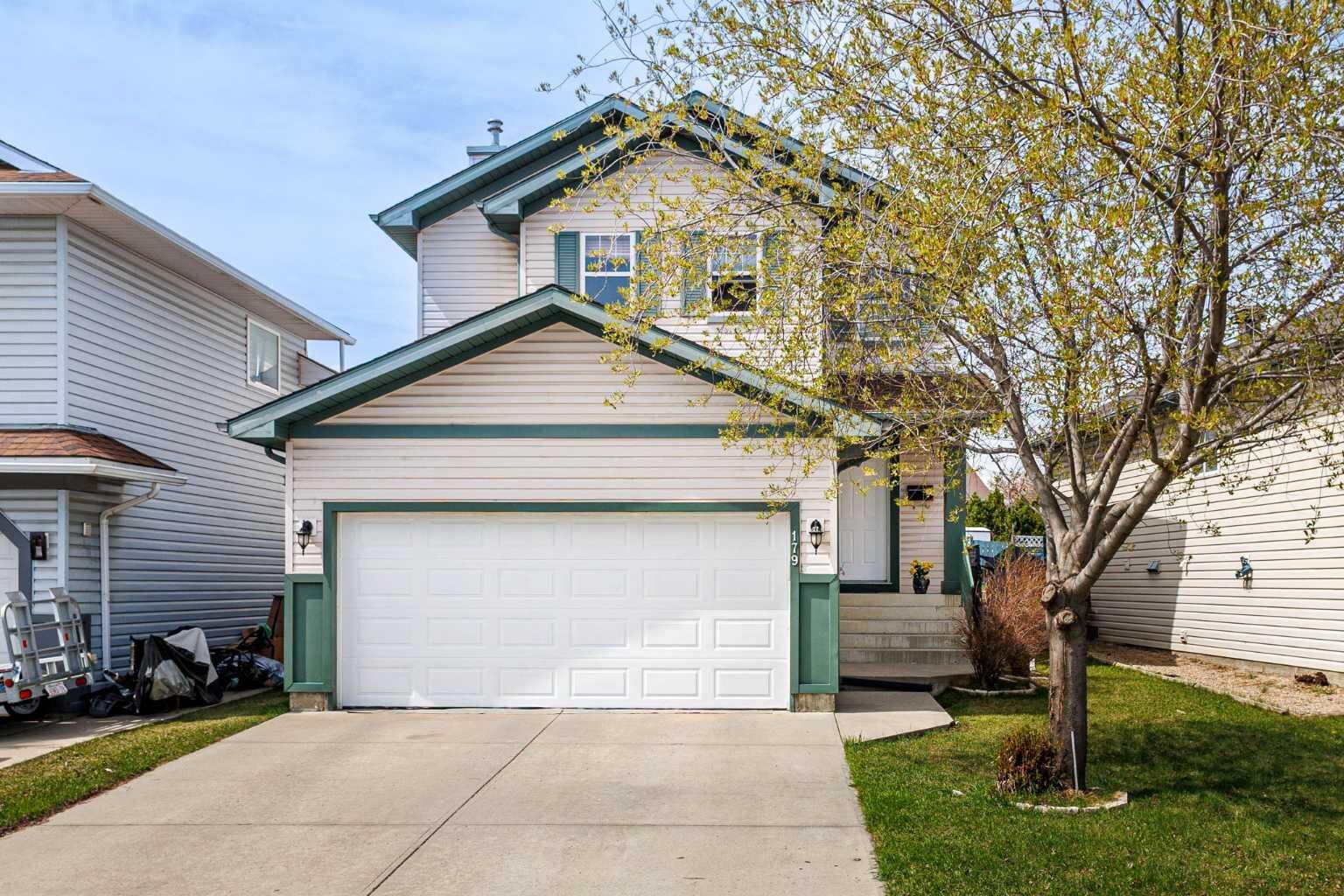 Property Photo:  179 Erin Park Drive SE  AB T3B 3L5 