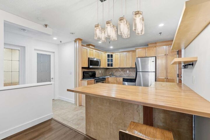 Property Photo: 717 4A Street NE 107 AB T2E 3W1