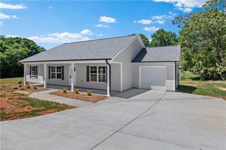 Property Photo:  5044 Polk Avenue  NC 27106 