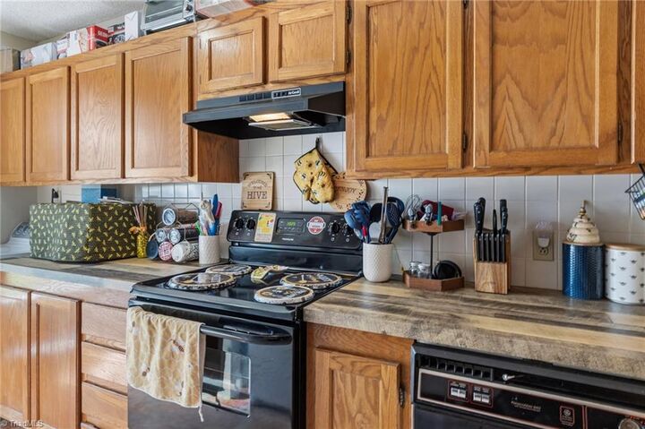 Property Photo:  5918 King Charles Court  NC 27012 