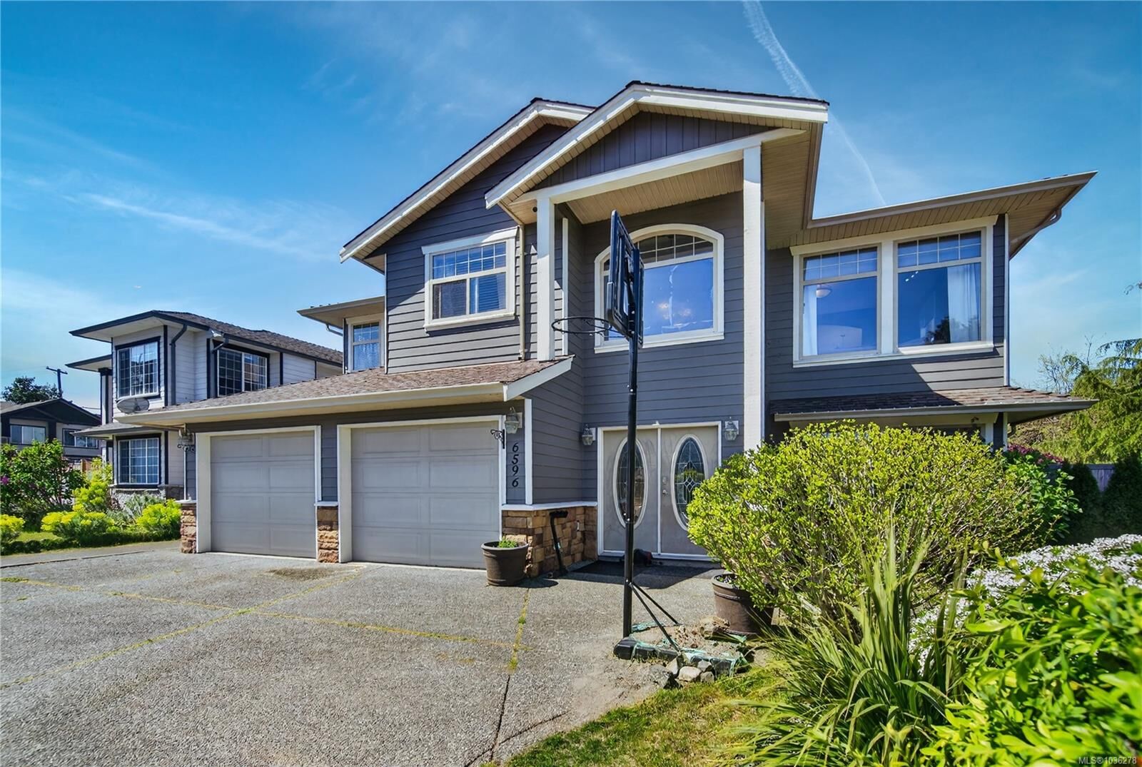 Property Photo:  6596 Kestrel Cres  BC V9V 1V9 