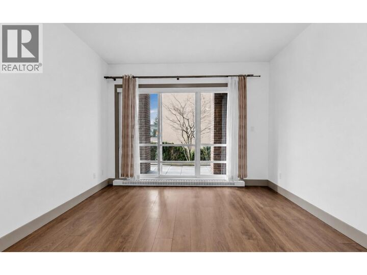 Property Photo:  6875 Dunblane Avenue 103  BC V5J 0G6 
