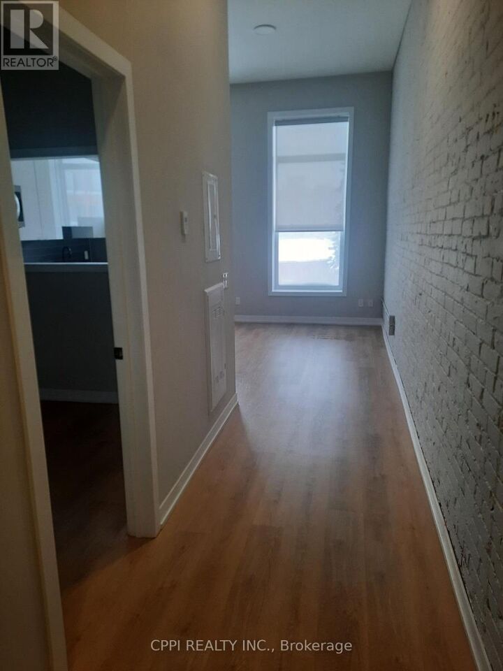 Property Photo:  140 Simcoe Street 208  ON K9H 0K5 