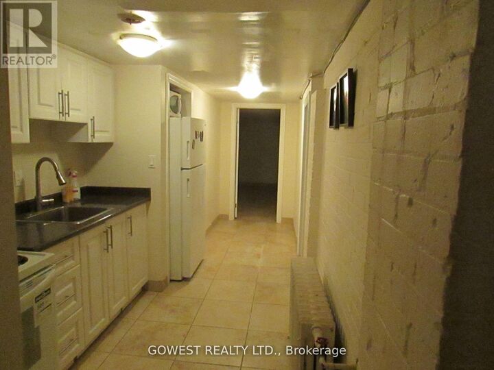 Property Photo:  2011 Dundas Street West Bsmt  ON M6R 1W7 