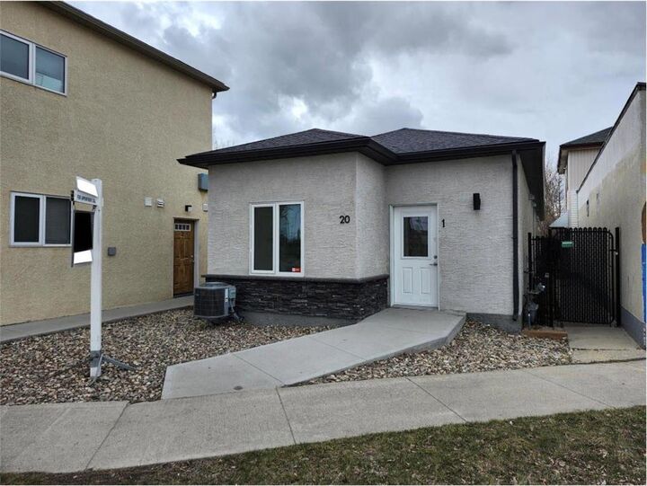 Property Photo: 20 Railway Street MB R2X 2P9