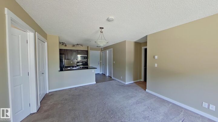 Property Photo:  3315 James Mowatt Trail SW 133  AB T6W 3L9 