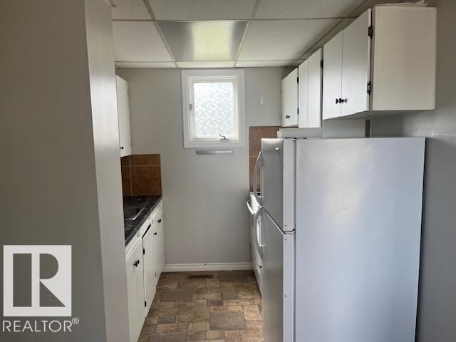 Property Photo:  6117 120 Avenue NW  AB T5W 1L9 