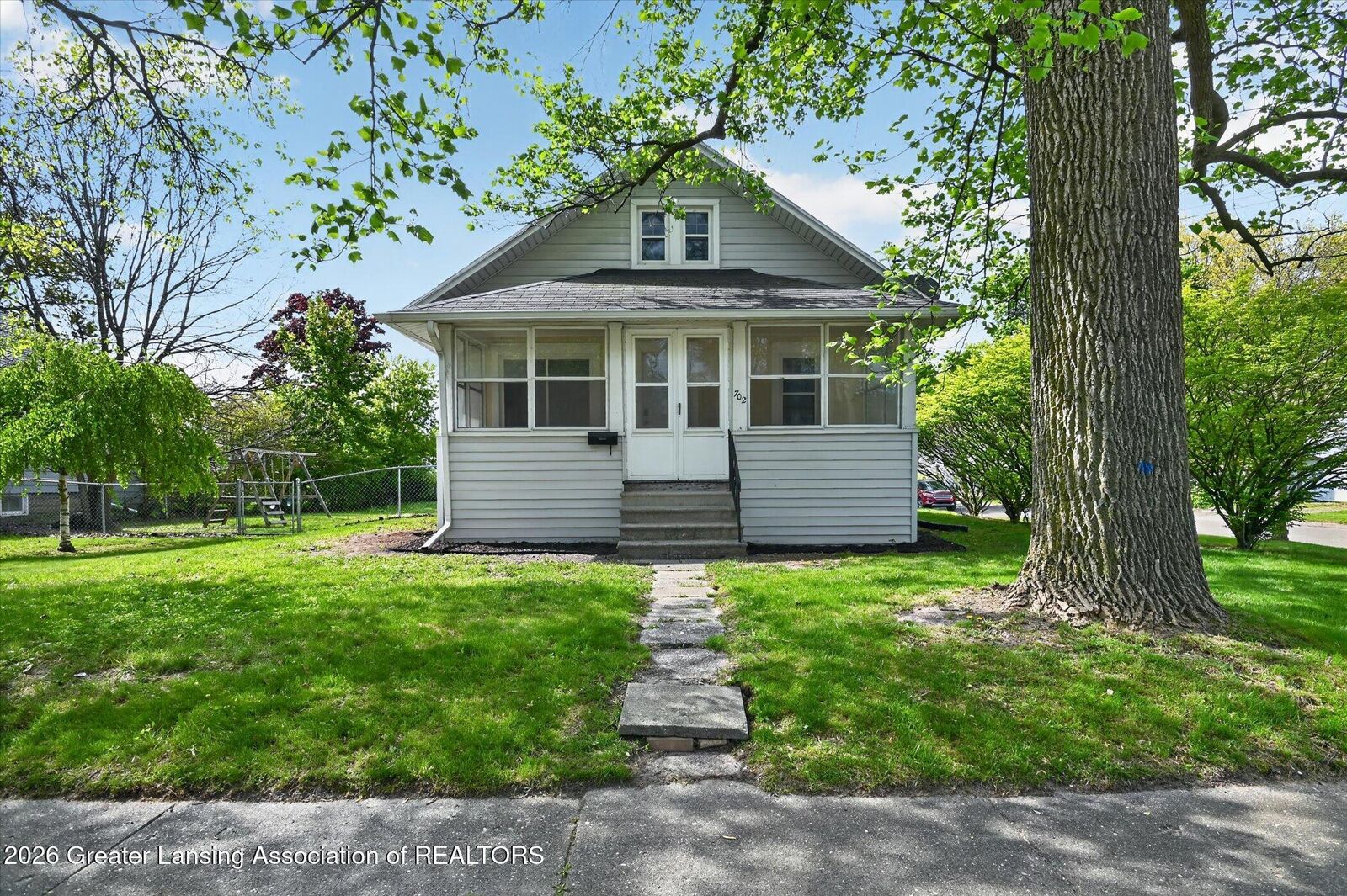 Property Photo:  702 E Cavanaugh Road  MI 48910 
