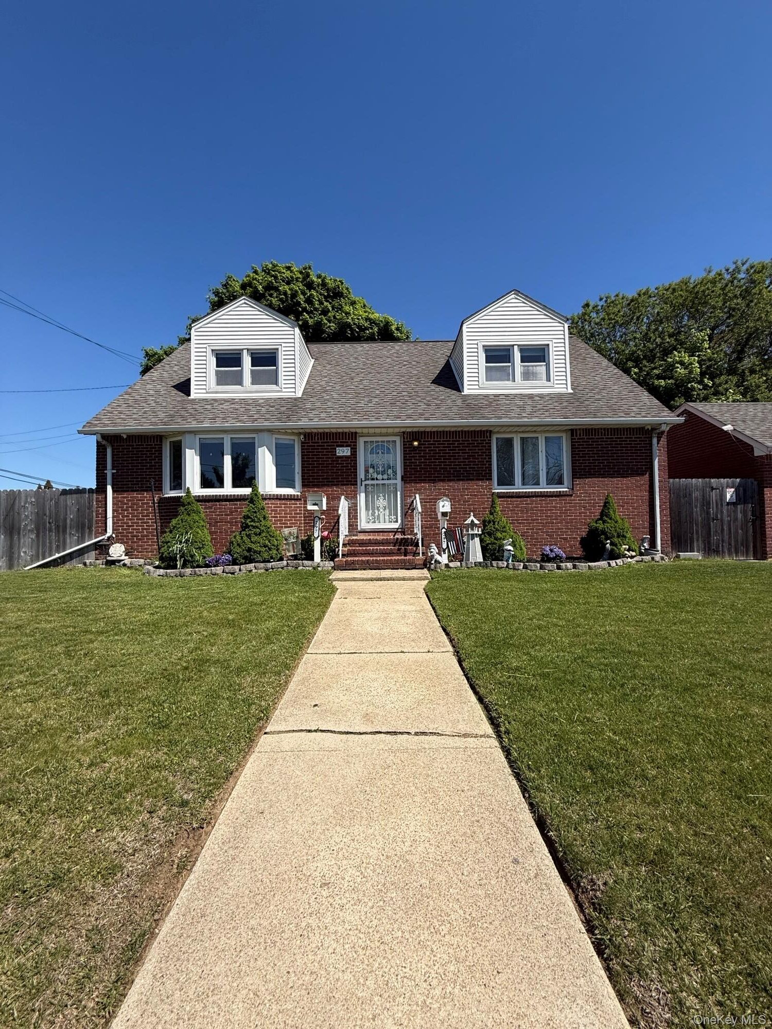 Property Photo:  297 N Syracuse Avenue  NY 11758 