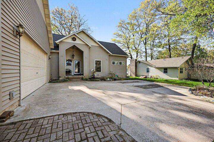 Property Photo:  5550 Cozy Point Drive  MI 49337 