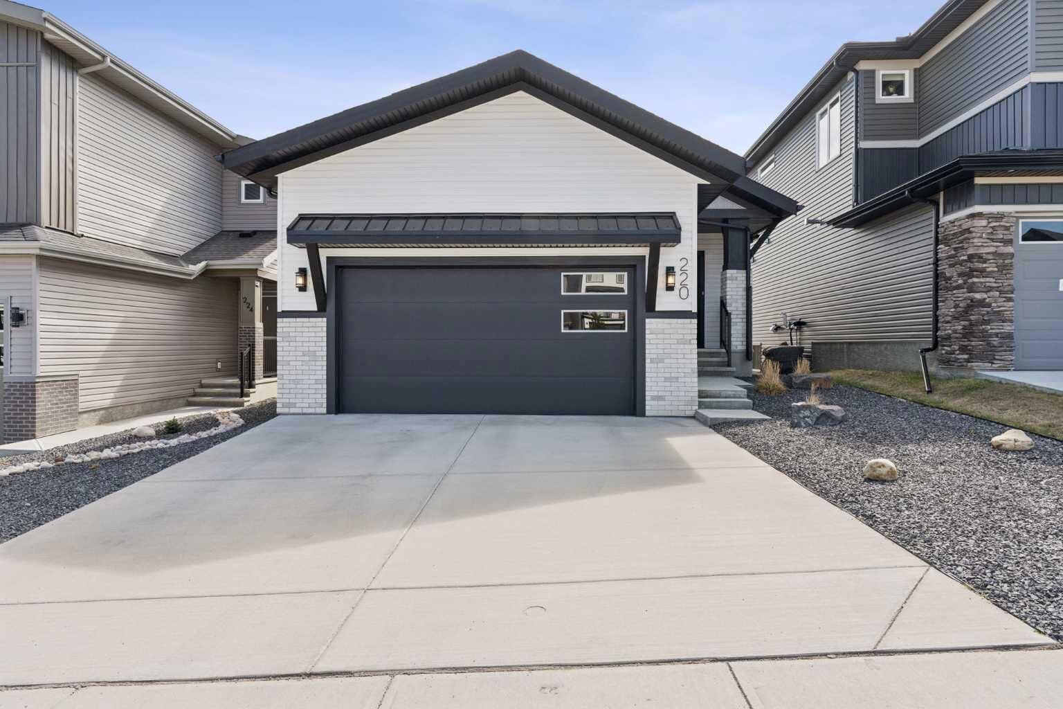 Property Photo:  220 Precedence View  AB T4C 2W8 