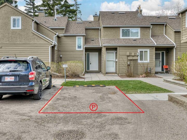 Property Photo:  829 Coach Bluff Crescent SW 202  AB T3H 1B1 
