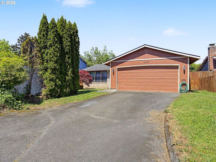 Property Photo:  13725 SE Center St  OR 97236 