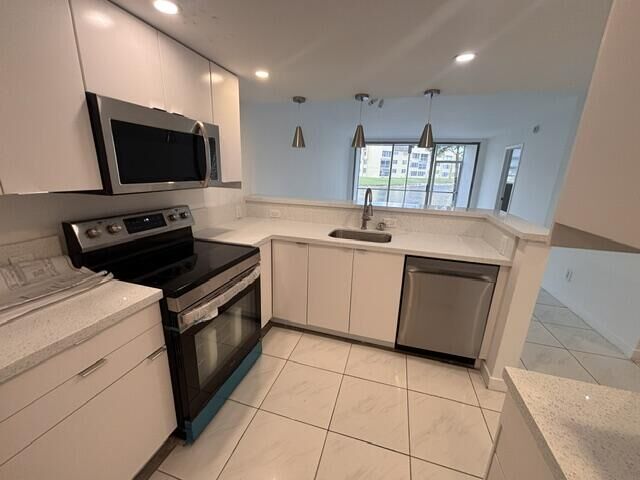 Property Photo:  6051 NW 61st Avenue 103  FL 33319 