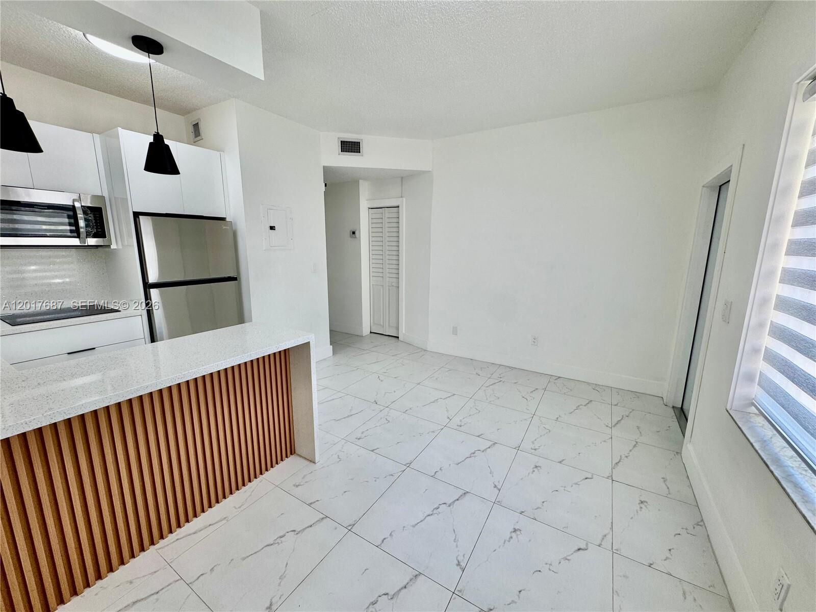 Property Photo:  421 NW 13th Ave A  FL 33125 