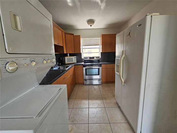 Property Photo:  2651 NW 13th St 45  FL 33125 