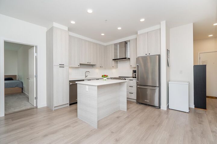 Property Photo:  7133 14th Avenue 102  BC V3N 0H5 