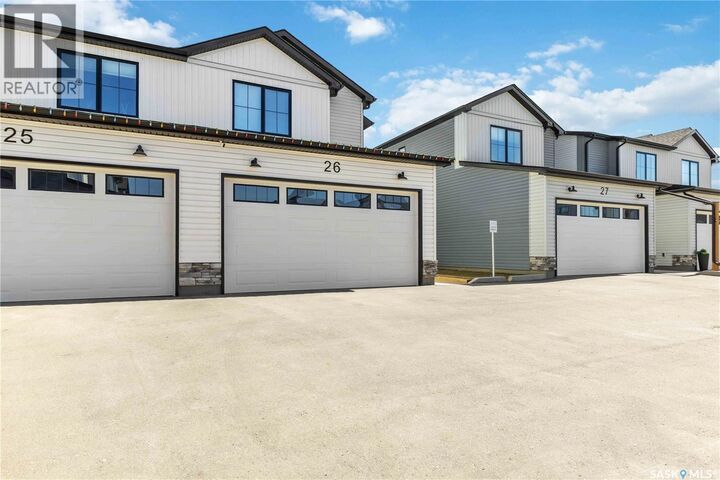 Property Photo:  26 625 Dagnone Crescent  SK S7V 1K9 