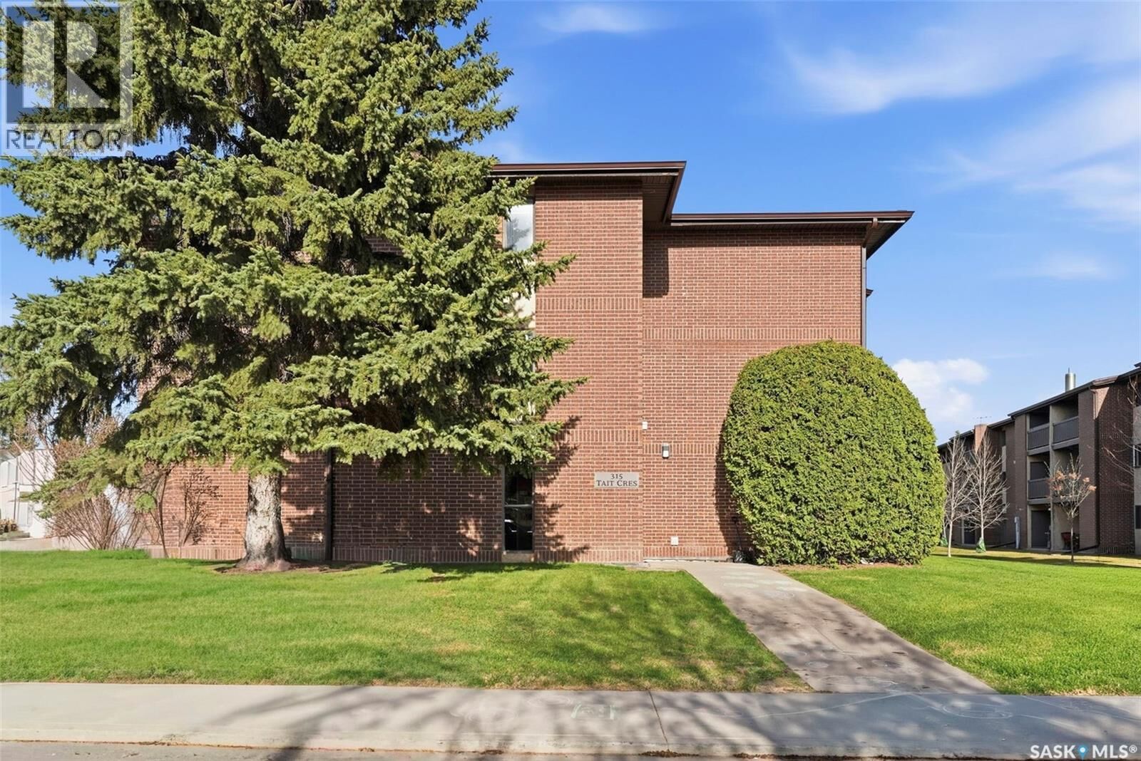 Property Photo:  105 315 Tait Crescent  SK S7H 5L6 
