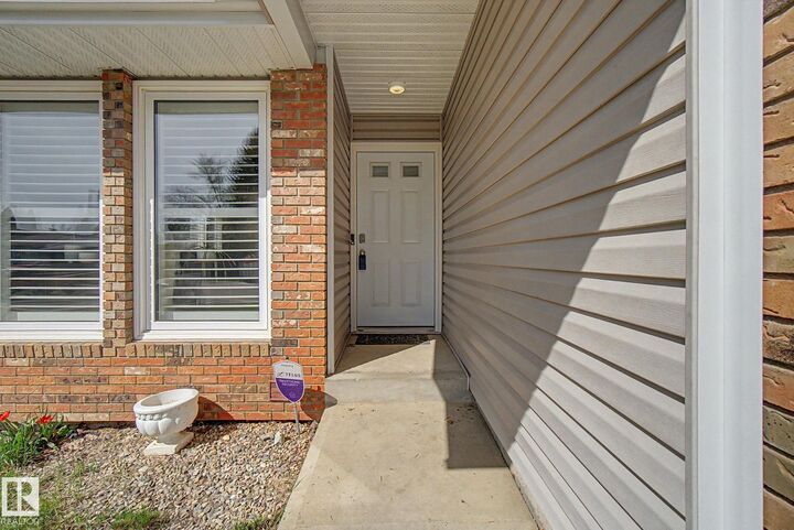 Property Photo:  42 Woodlake Road  AB T8A 4B7 