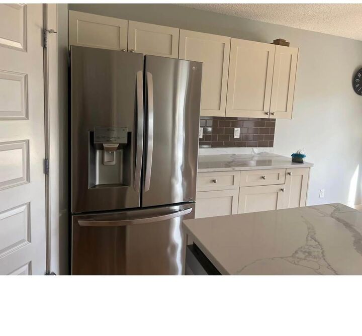Property Photo:  1699 Cunningham Way SW  AB T6W 0W5 