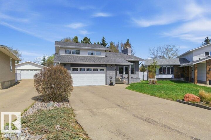 Property Photo:  8608 22 Ave NW  AB T6K 1Z8 