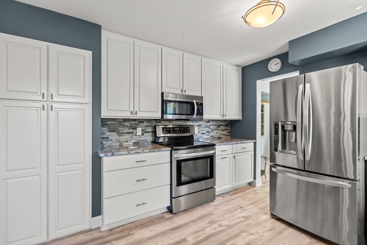 Property Photo:  2401 W Manchester Ave  WI 53221 