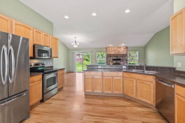 Property Photo:  1280 Wrenfield Way  WI 53066 