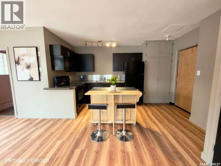 Property Photo:  2 400 4th Avenue N  SK S7K 0R3 