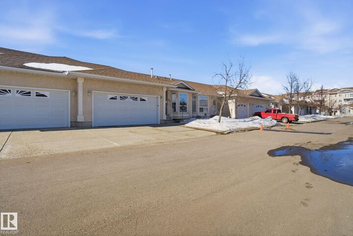 Property Photo: 13320 124 St NW 56 AB T5L 5B7